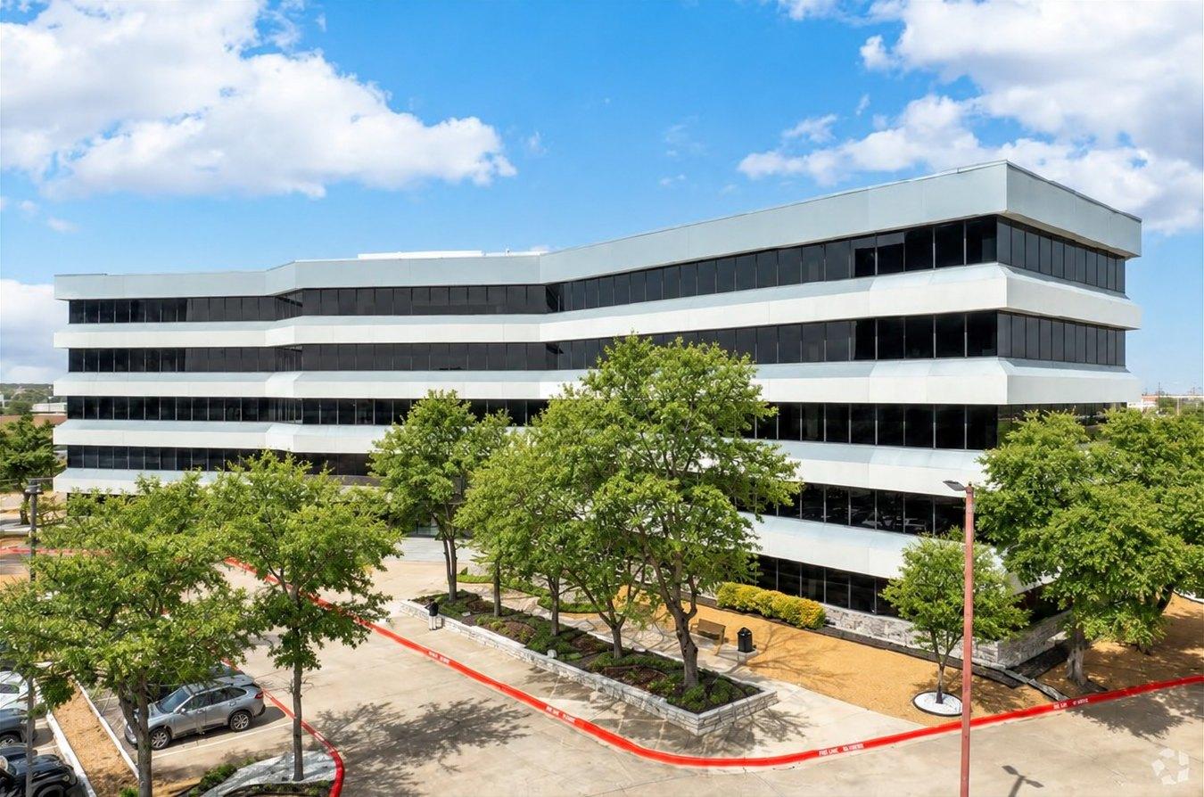 Exterior of the office building at 555 Republic Dr in Plano, Texas